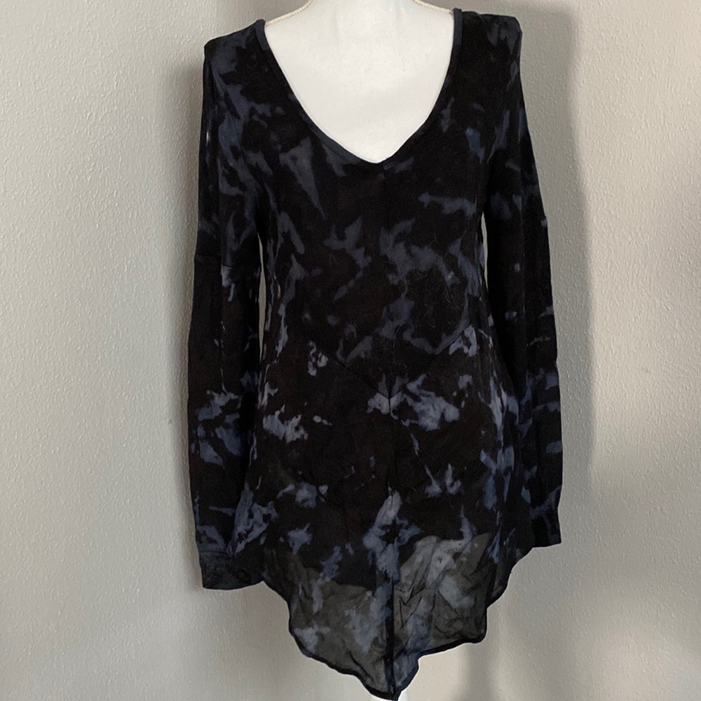 Soft tunic with semi sheer bottom 6 inches.